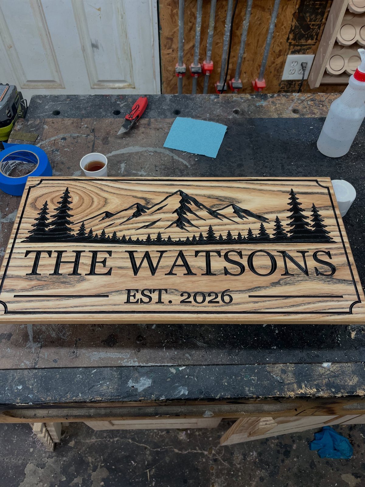 CNC Router Projects and Ideas: 10 Wood Pieces to Make 5 Wooden personalized sign with carved mountains and the text The Watsons Est 2026