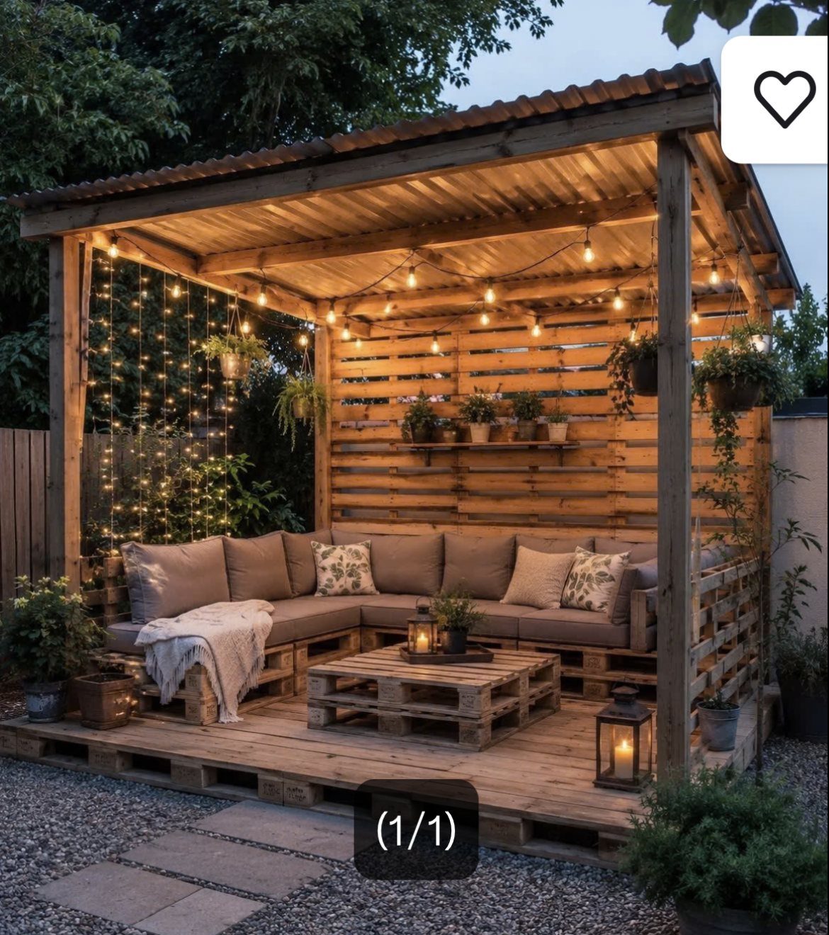 5 DIY Pallet Gazebo Ideas for Backyard Shade and Seating 4 Wooden pallet pavilion with a cozy lounge area, grey cushions, and warm string lighting.
