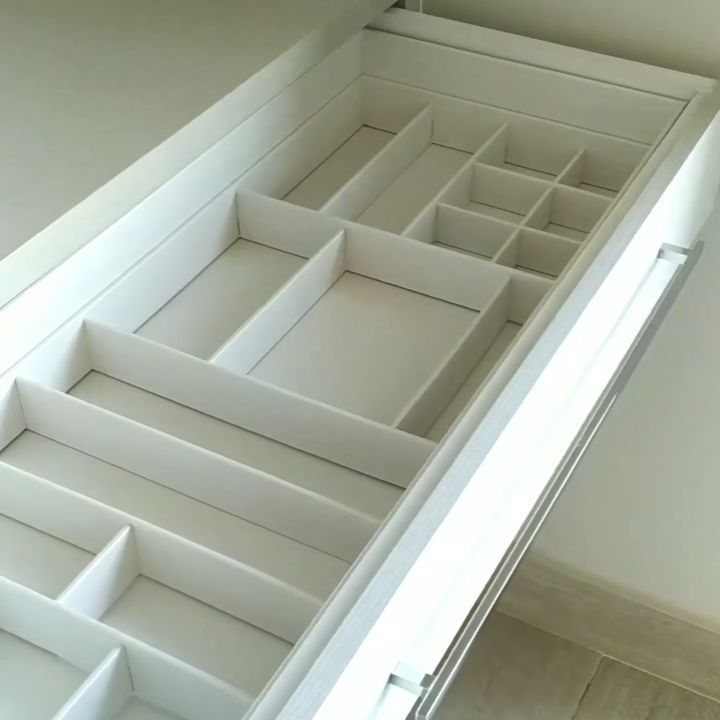 14 Easy Things to Make Out of Wood for Beginners 7 White wooden drawer with custom dividers creating organized rectangular storage compartments.