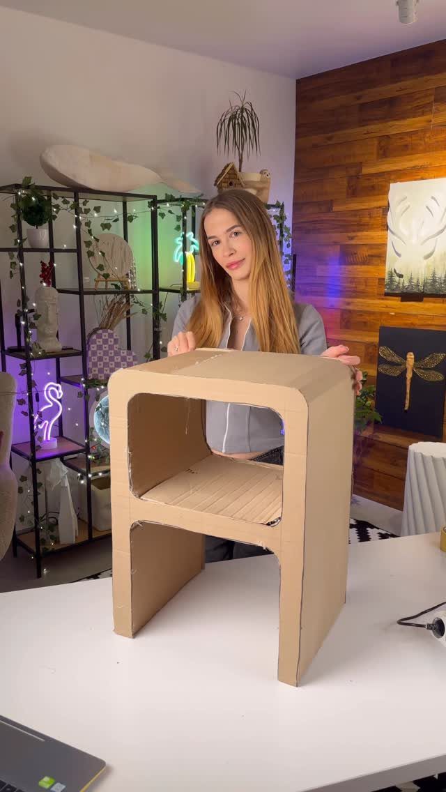 9 Easy to Make Furniture Ideas for Beds, Benches and More 9 Cardboard stool handmade by a woman standing in a room with wooden walls.