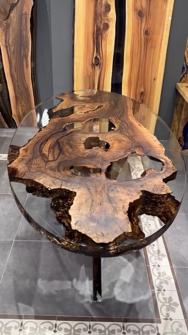 9 Epoxy Resin Wood Projects: Tables, Trays, Clocks and Coasters 9 Round coffee table with a natural wood slab embedded in clear epoxy resin