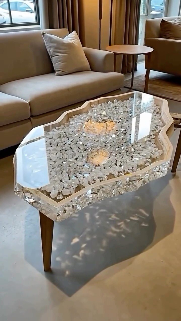 9 Epoxy Resin Wood Projects: Tables, Trays, Clocks and Coasters 2 Coffee table with natural wood edges and clear epoxy resin filled with crystals.