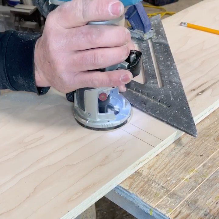Furniture Making Tools: 11 Hand and Power Tools to Own 5 Hand using a power router and speed square to cut a groove in plywood.