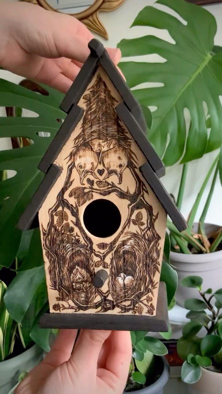 How to Burn Wood Art: 12 Ideas for Every Skill Level 5 Wooden birdhouse with detailed burned art of owls and trees held by hands.