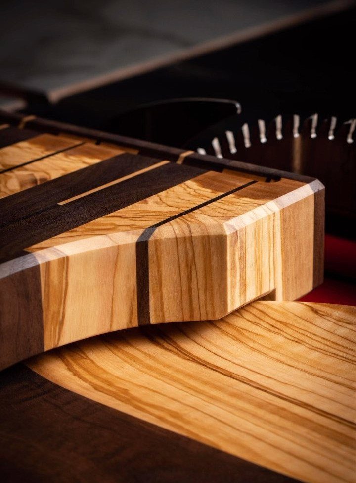 14 Shop Class Projects to Build: Bookshelf to Plywood Cart 4 Wooden cutting board with alternating light and dark wood strips and juice groove.