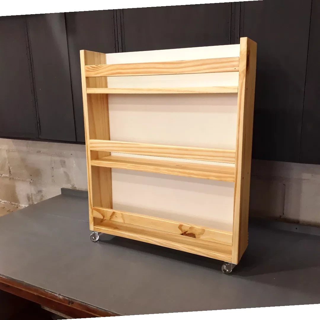 14 Shop Class Projects to Build: Bookshelf to Plywood Cart 1 Wooden child's bookshelf with three shelves and caster wheels on a workbench.