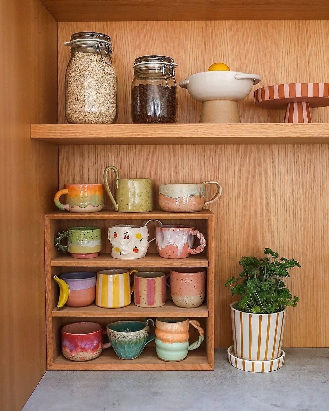 Small Wooden Rack Ideas: 9 Shelves, Stands and Holders 2 Light wood counter shelf holding colorful ceramic mugs in a kitchen setting.