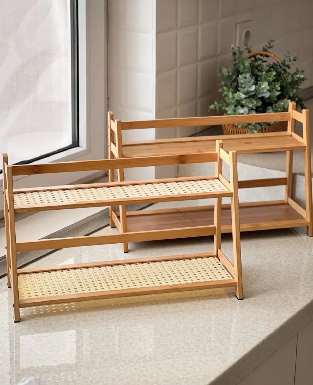 Small Wooden Rack Ideas: 9 Shelves, Stands and Holders 7 Two light brown bamboo two-tier racks with woven cane shelves on a countertop.