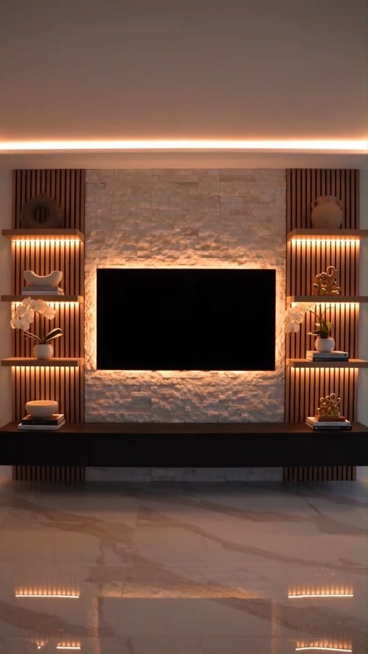 Modern living room wall with vertical wood slat panels and integrated warm lighting.
