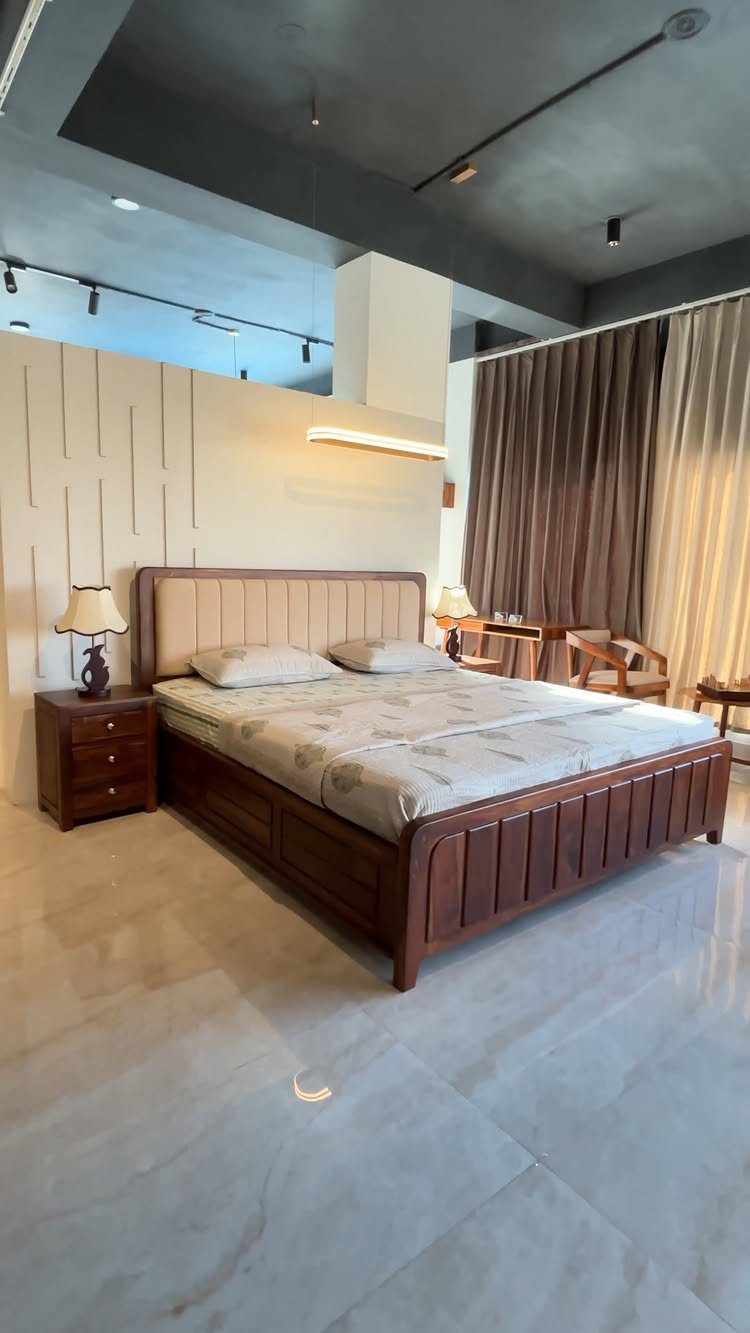 Wood Bed Design Ideas: 5 Styles for Every Bedroom 2 Dark wood bed frame with beige upholstered headboard in a modern bedroom setting