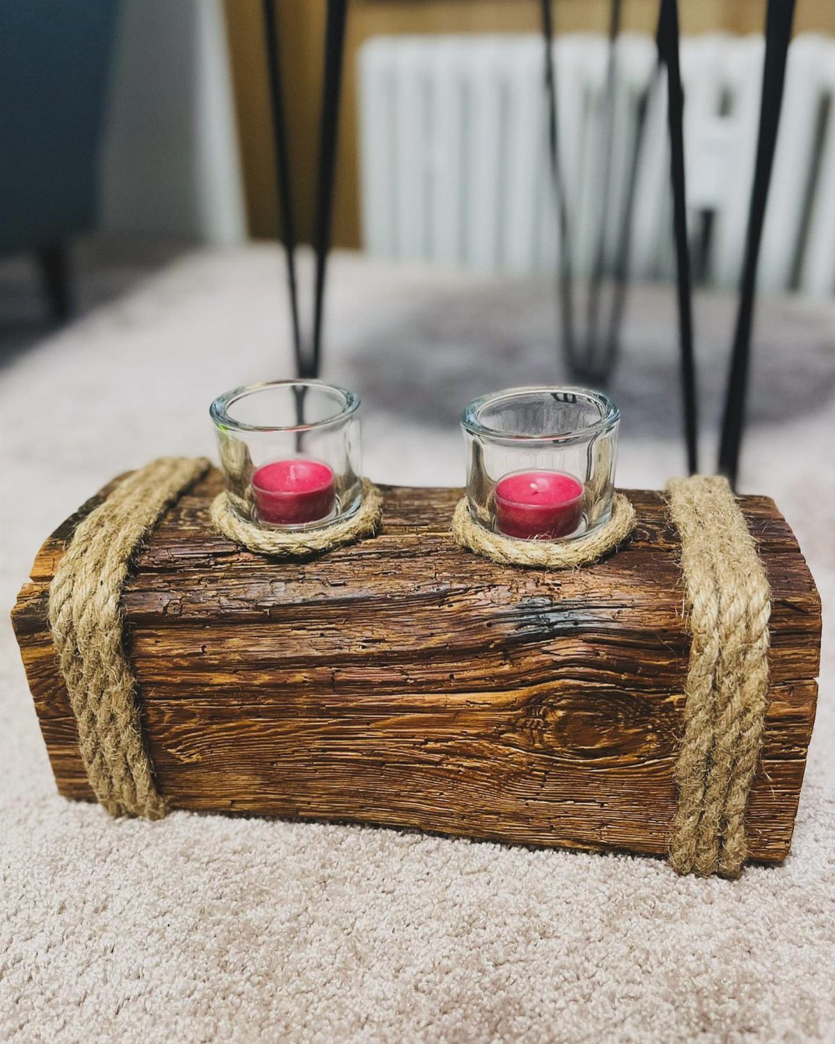 14 Wood Block Decorations for Every Season and Room 9 Rustic wood block candle holder with red tea lights and jute rope accents.