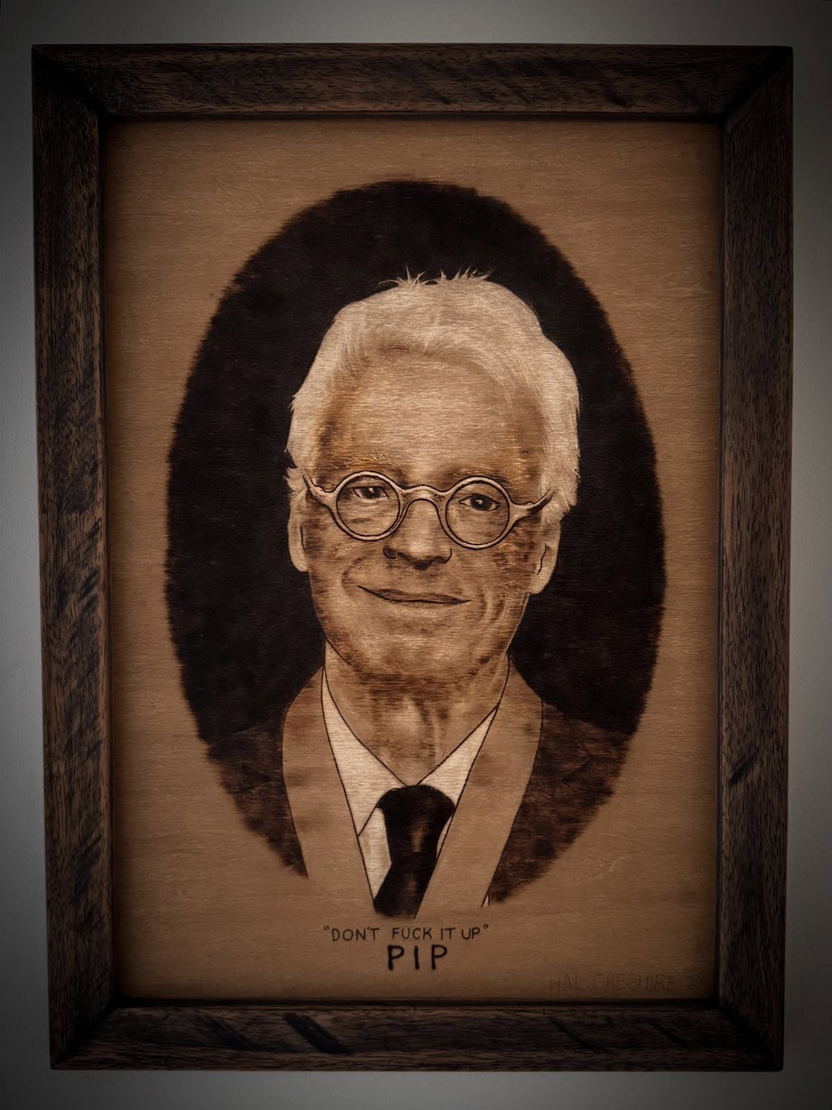 Wood Burning Lettering Ideas: 4 Styles to Try Next 4 Wood burned portrait of a man with glasses and lettering on a wooden plaque