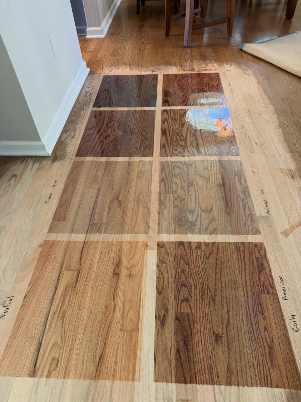 Wood Grain Stain: 8 Ideas for Color and Application 2 Wooden floor samples showing various stain colors for comparison and color matching.