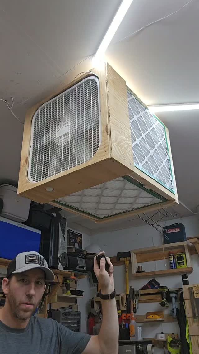 8 Woodshop Design Ideas for Smarter Storage and Layout 3 Wooden air filtration unit with white filters mounted to a woodshop ceiling.