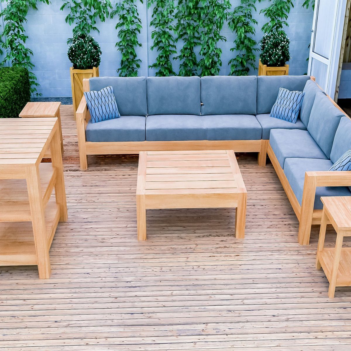 Wooden outdoor lounge set with blue cushions and a coffee table on a deck.