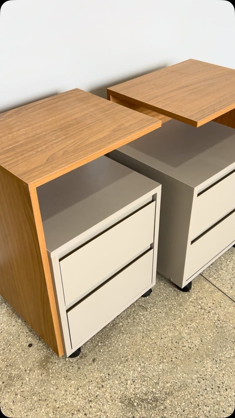 Woodworking Shop Furniture: 4 Ideas for Your Workspace 3 Two mobile storage units with wooden tops and white drawers on a concrete floor.