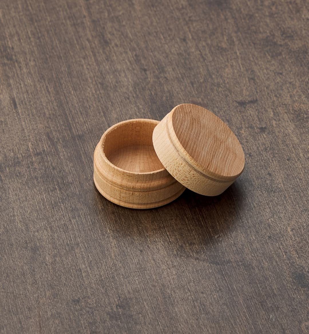 Woodworking Small Box Ideas: 5 Projects to Build 4 Small circular wooden pill box with lid on a dark wood table